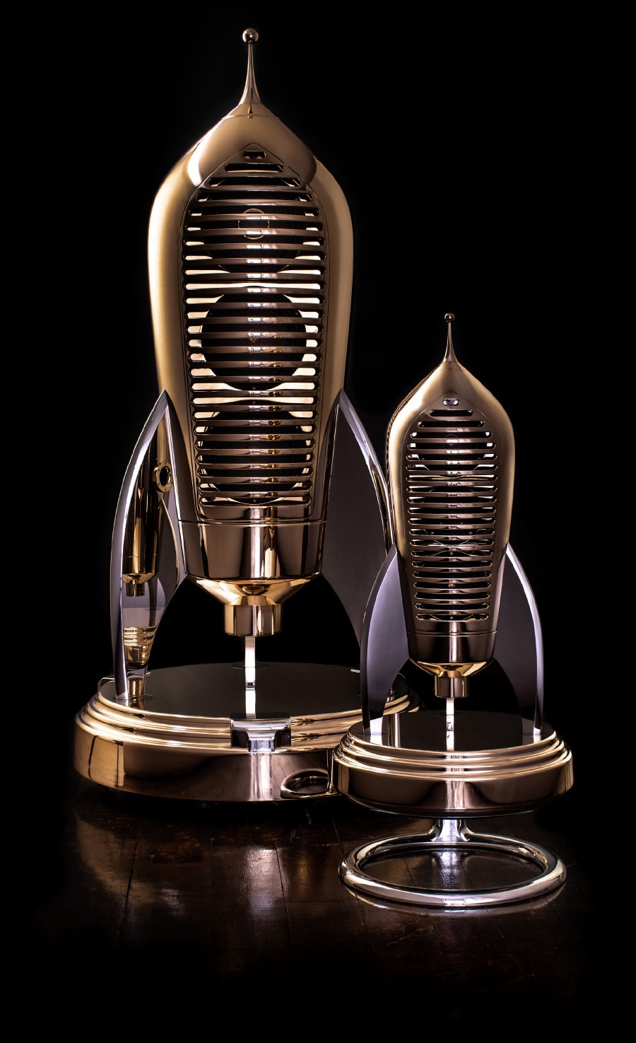 The Cosmotron 130, pictured with the smaller Cosmotron 50 loud speaker.